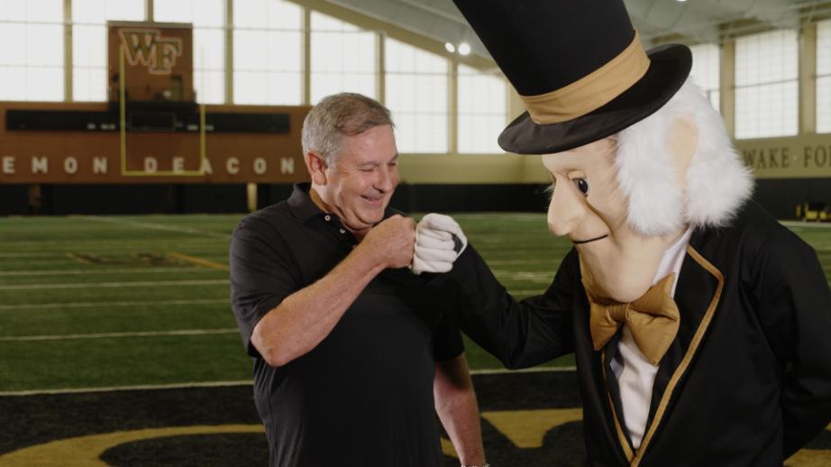 TW_with_Demon_Deacon-03-Fist_Bump image Wake Forest University Partnership